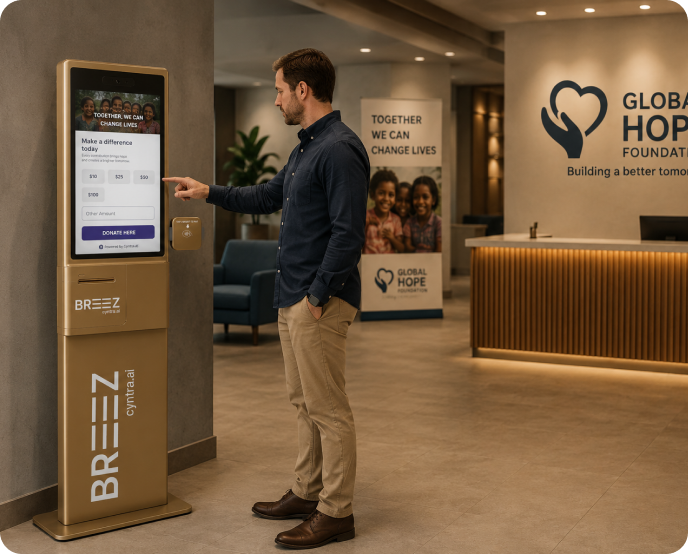 People donating using a kiosk at a charity event